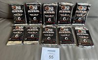 Ten sealed 1991-92 Pro Set hockey card packs laid out on surface