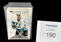 Front view of cards in plastic storage box showing card design