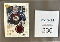 Front of Patrick Roy 2003-04 Pacific Authentic Game Worn Jersey card with burgundy swatch