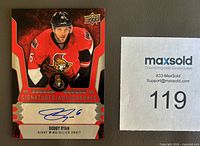 Front of Bobby Ryan Upper Deck Tim Hortons autograph card next to lot ID