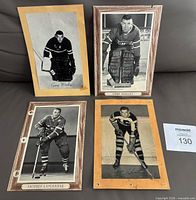 Front view of all four Beehive hockey photos laid out
