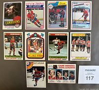 Front view of all 10 Guy Lafleur hockey cards in top loaders