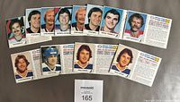 Front view of 12 Esso NHL TV Cash Game panels showing player photos and scratched-off vouchers