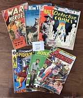All seven comic books fanned out
