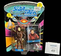 Front of sealed Lore figure showing accessories and numbering