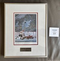 Full view of framed, matted signed print with plaque