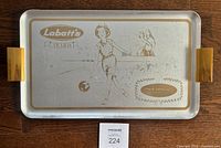 Front of silver Labatt’s Award bowling tray with gold graphics and handles