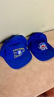 Overall view of both blue Jays hats