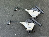 Both Cannon downriggers shown full length