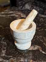 marble mortar and pestle on countertop