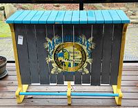 Full view of front of wooden bar