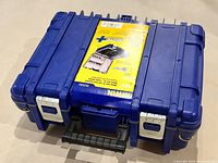 Toolbox closed showing overall exterior and carry handle