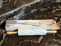rolling pin and retail box on countertop