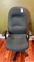 Front view of green fabric office chair