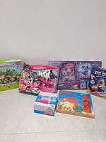 Group shot of all six sealed craft kits