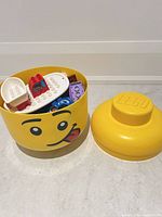 Storage head open showing Duplo pieces inside