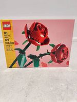 Front view of LEGO 40460 Roses sealed box showing artwork and piece count