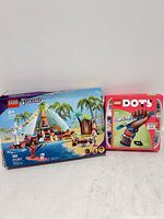 Front of LEGO Friends 41700 and LEGO DOTS 41807 boxes