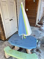 Little Tikes blue tabletop, green benches, beige base, umbrella installed