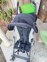 Full view of Maclaren Volo stroller from front, showing canopy, seat and frame