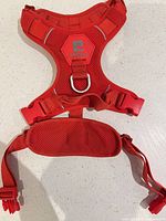 Front view of rcpets red large harness showing mesh chest plate, front no-pull ring, straps and buckles