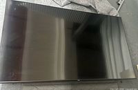 Front view of entire 75-inch Samsung QLED screen lying flat