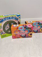 All three boxed sets on floor