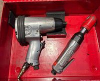 Chicago Pneumatic air impact wrench and pneumatic air ratchet inside red toolbox