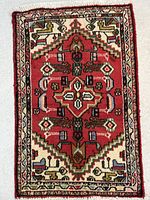 Full view of Hamadan wool rug showing overall design and colours