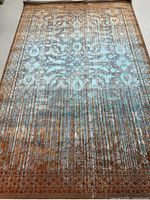 Full view of rug showing pattern and colors