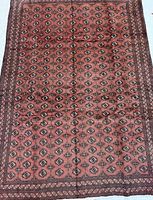 Full view of Turkman rug showing overall pattern and borders