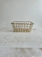Front view of rectangular gold wire basket