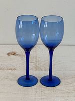 Front view of both cobalt blue wine glasses