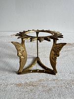 Overall view of brass celestial stand