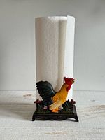 Holder with paper towel roll for scale