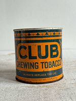 Front of Club Chewing Tobacco tin showing branding and weight
