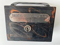 Front view showing Bankers Trust plate, lock, finish