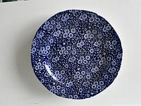 front view of single Calico plate showing pattern
