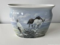 Front view showing hand-painted pastoral scene with ploughman, horses, seagulls