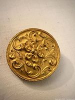 Front view showing full round embossed design