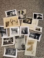 All photographs spread on carpet showing variety of images