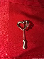 Front view showing open heart design and rhinestones