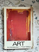 Front cover showing title, edition, abstract artwork, visible wear