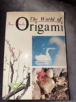 Front cover of The World of Origami book showing title, author and origami images