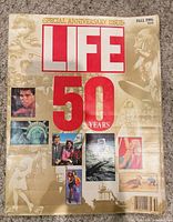 Front cover showing title, 50 Years banner, Fall 1986, price