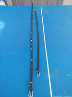 Belts front side showing hardware and length comparison