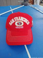 Front view showing embroidered SAN FRANCISCO 49ERS text and logo