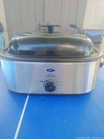 Front view of Oster roaster oven with lid in place