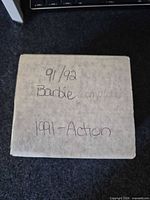 closed white cardboard card box labeled '91/92 Barbie (complete) 1991-Action'