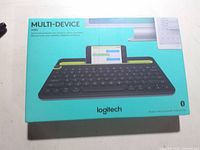 Front of sealed Logitech K480 box showing product image and branding